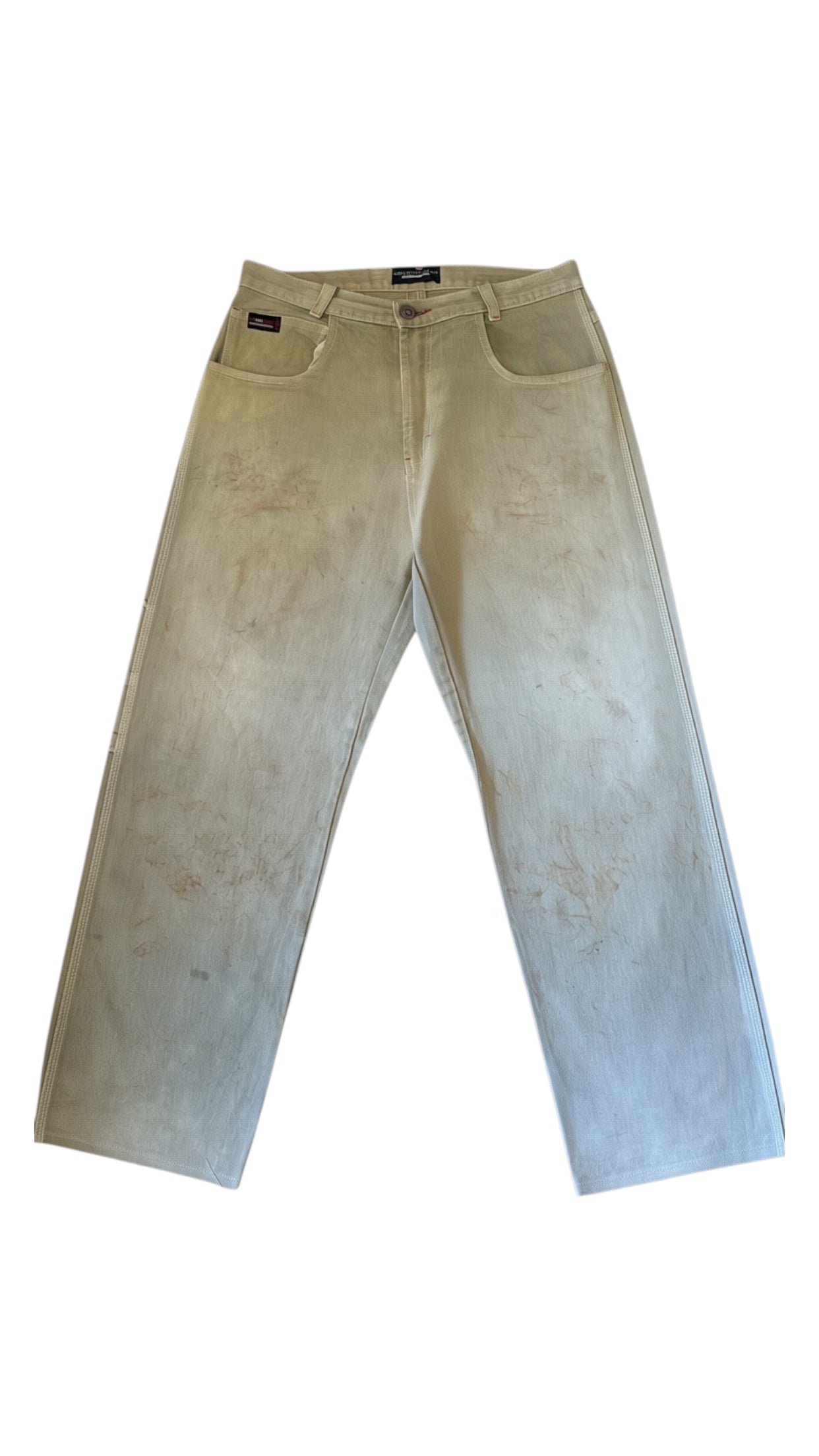SohoStich Co. light olive green cotton twill baggy carpenter pants with distressed finish, utility pocket, and hammer loop.