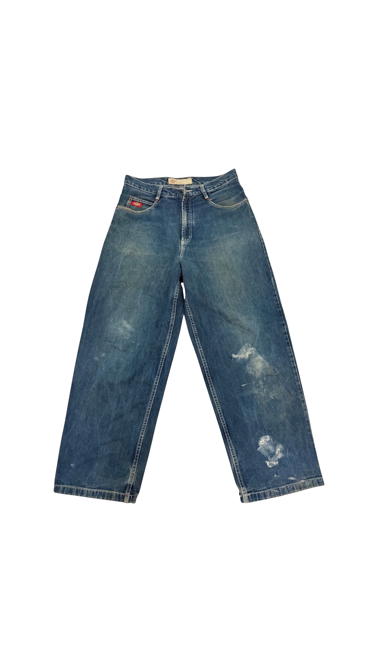 SohoStich Co. blue denim baggy distressed jeans with wide legs and a red logo tab.