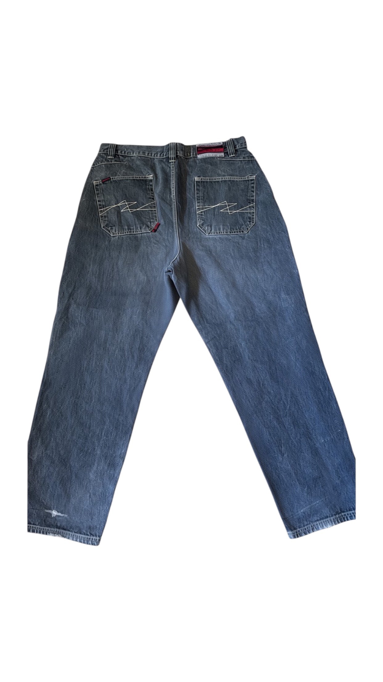 SohoStich Co. men's mid-wash denim jeans with a baggy fit, five-pocket style, and signature stitching.