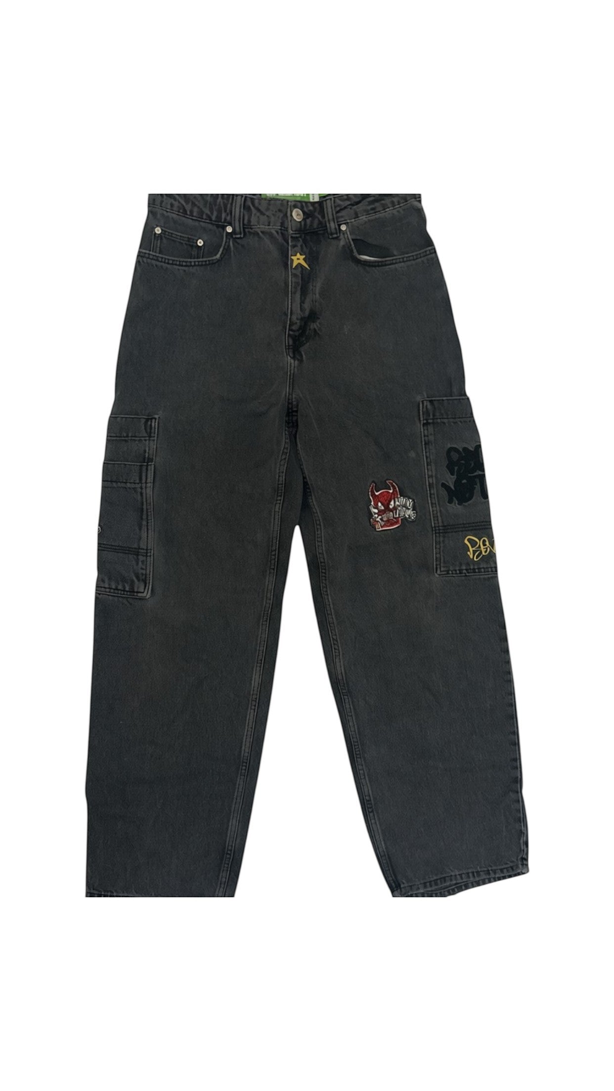 SohoStich Co. black washed denim baggy fit carpenter jeans with embroidered patches and graphic detailing.