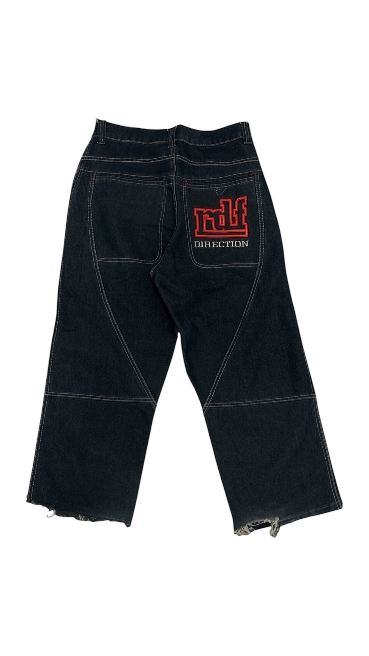 SohoStich Co. black denim jeans with red embroidered logo on back pocket and distressed hem.