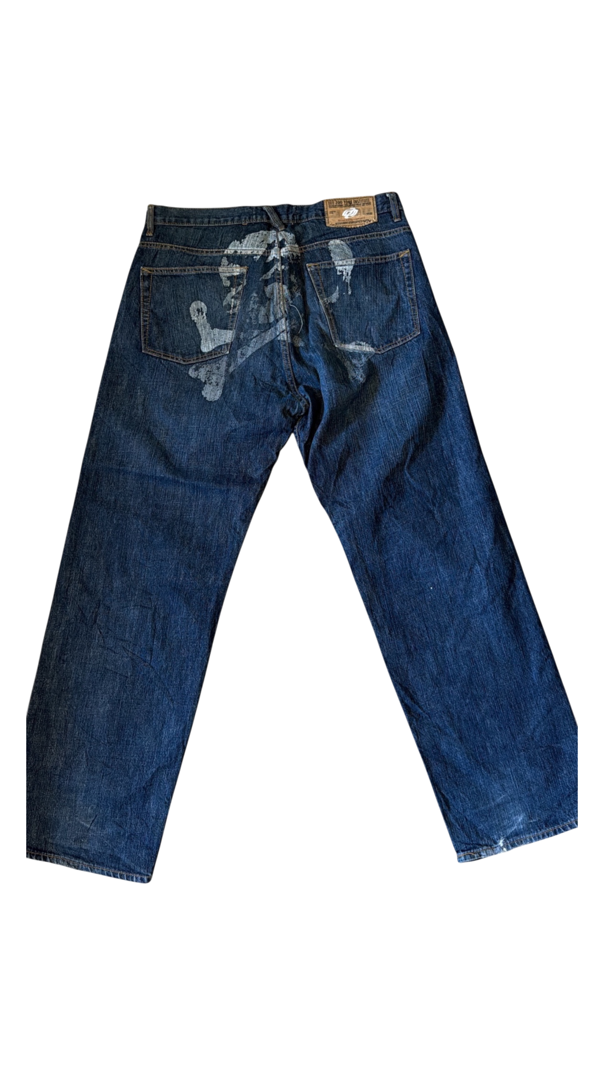 SohoStich Co. blue denim jeans with relaxed fit and graphic print on back.