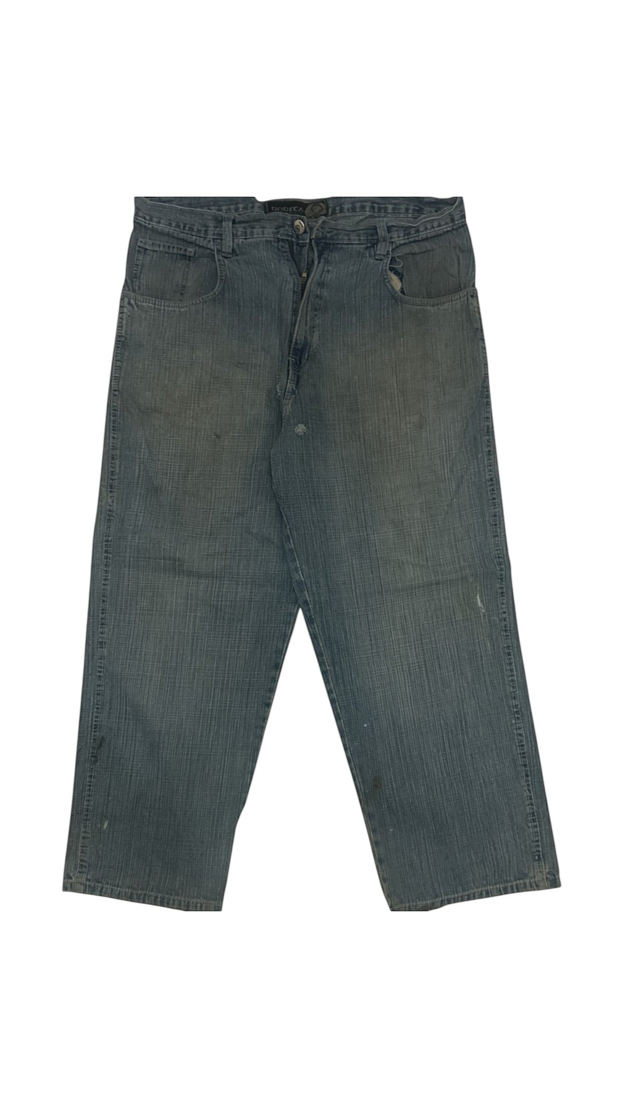 SohoStich Co. blue denim carpenter jeans with relaxed fit and distressed details.