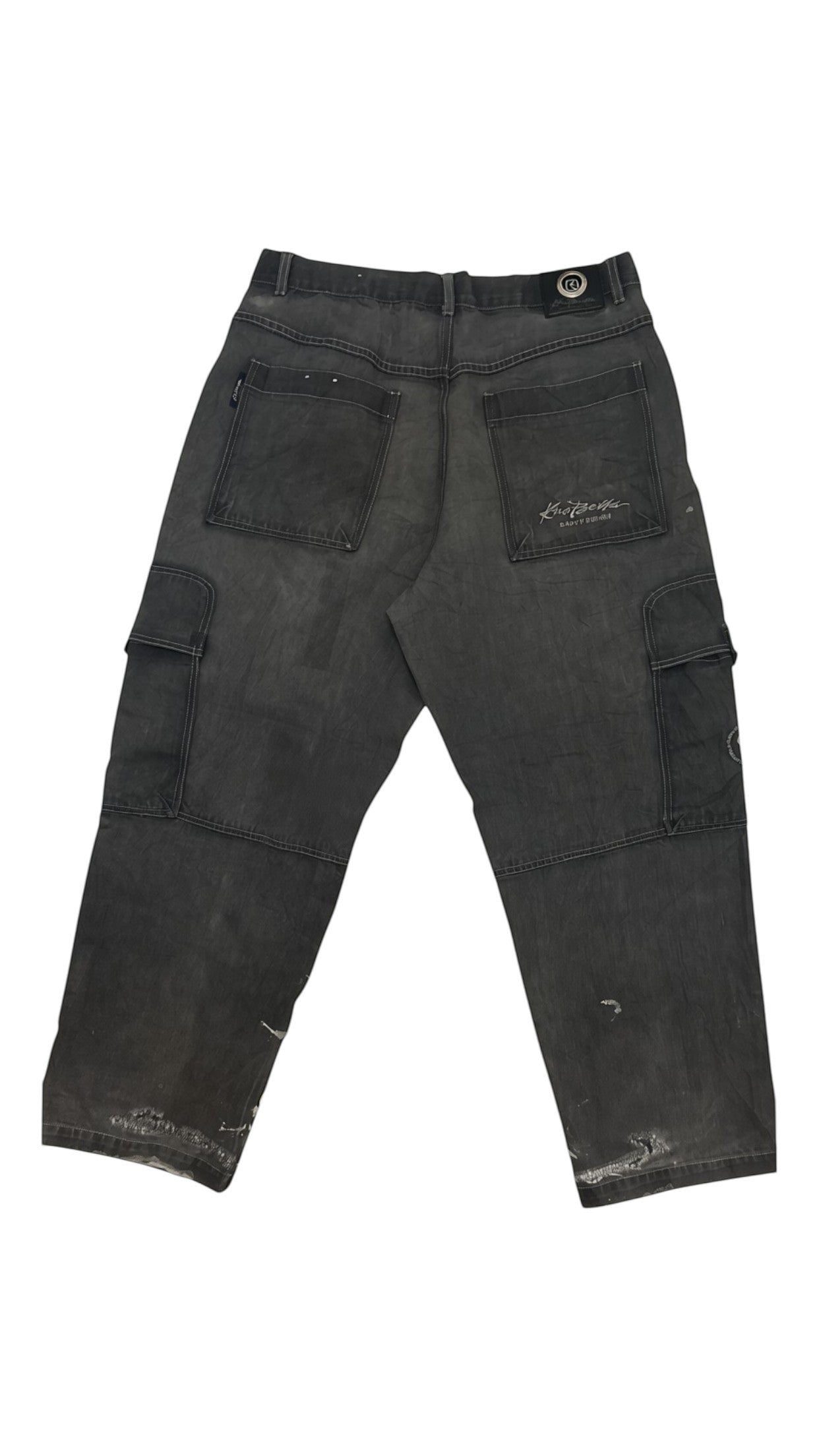 SohoStich Co. charcoal grey distressed denim cargo pants with signature embroidery and multiple pockets.