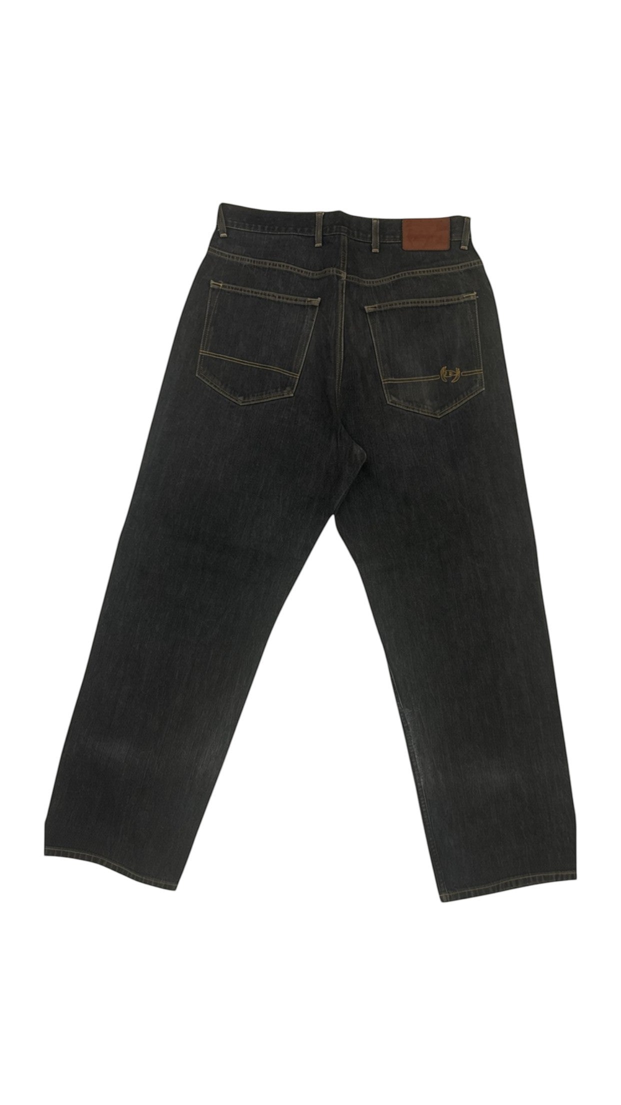 SohoStich Co. dark wash classic fit denim jeans with five-pocket design and leather logo patch.