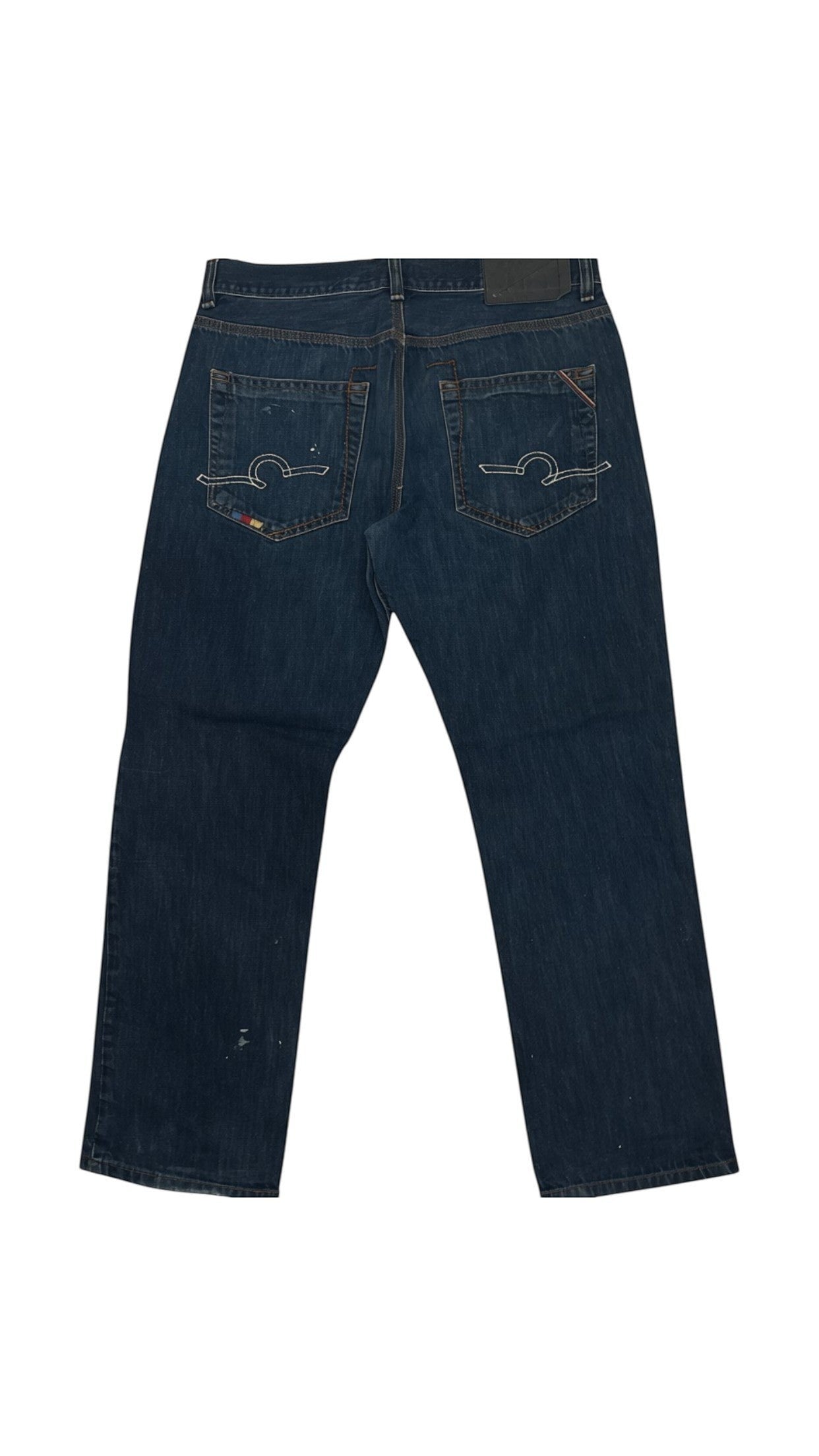 SohoStich Co. Men's dark wash denim jeans with white stitching and colorful embroidered pocket detail.