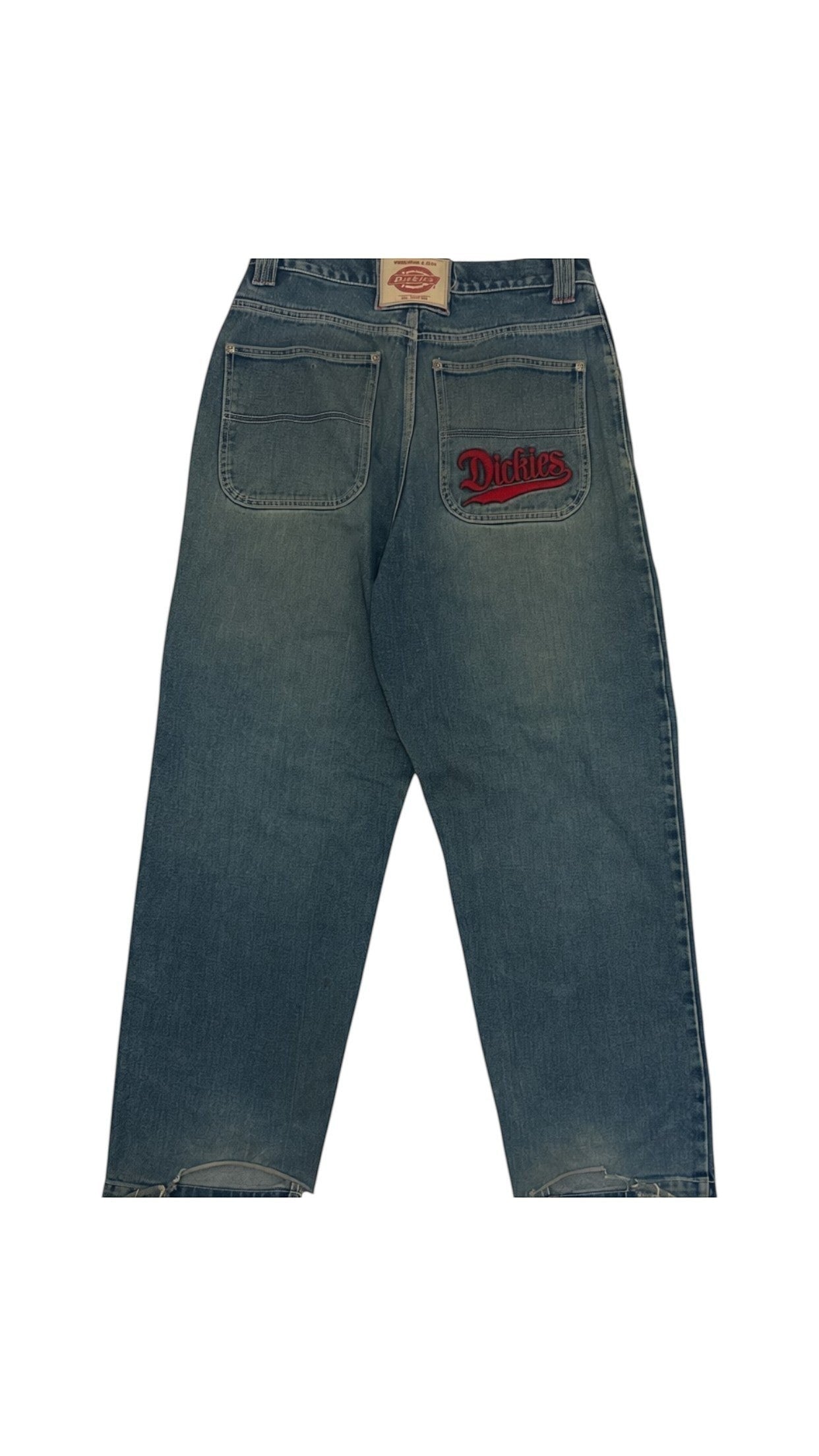 SohoStich Co. mid-wash denim jeans with relaxed fit and red embroidered Dickies logo on back pocket. Distressed hem.