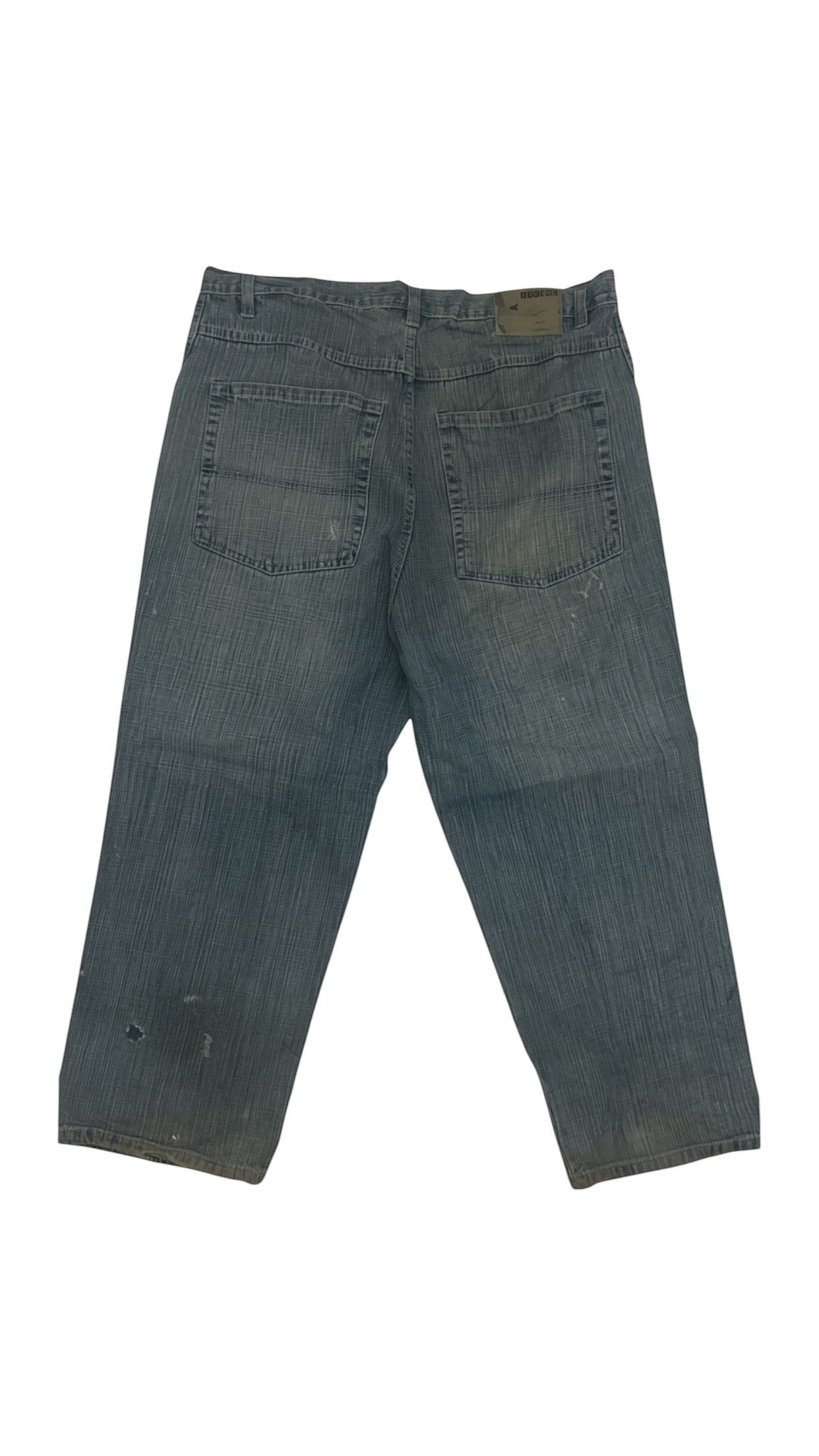 SohoStich Co. blue denim carpenter pants with relaxed fit and distressed details.
