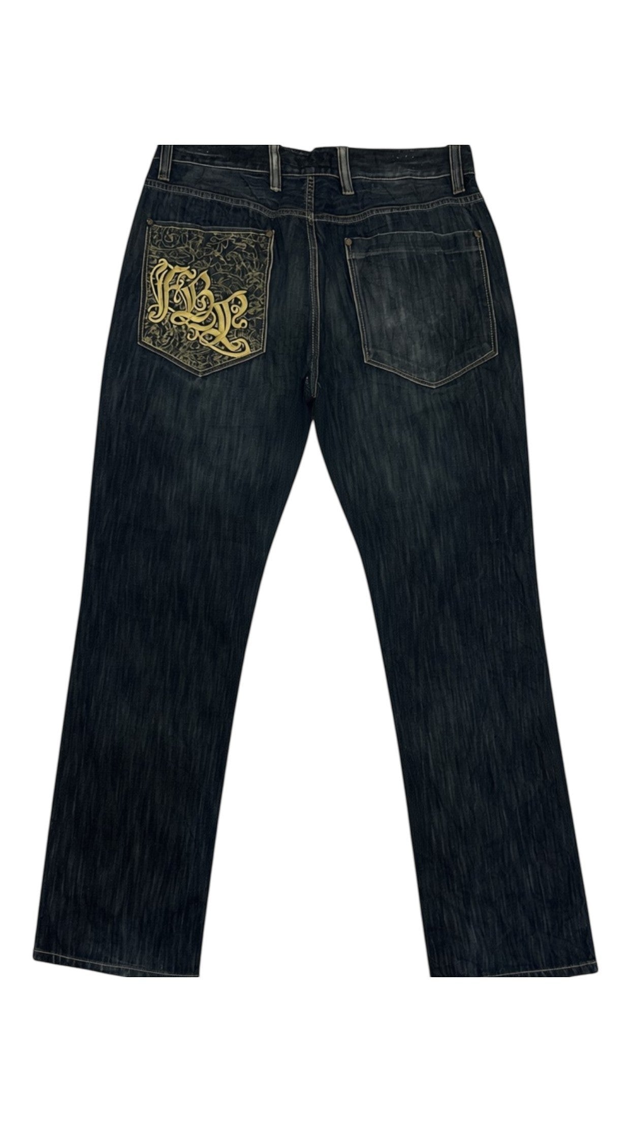 SohoStich Co. dark wash denim jeans with ornate gold embroidered back pocket and straight-leg silhouette.