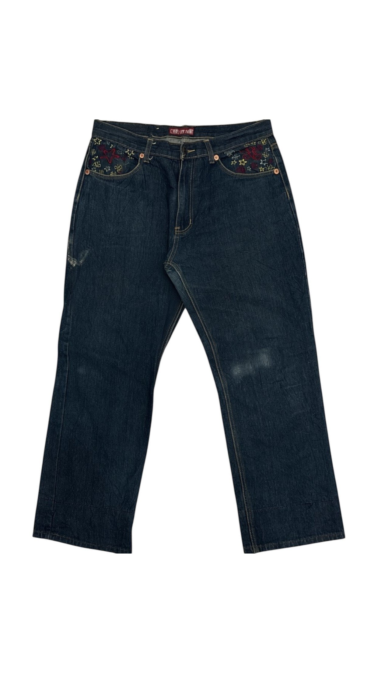 SohoStich Co. dark wash denim jeans with embroidered red and yellow stars and floral details on front pockets. Straight leg.