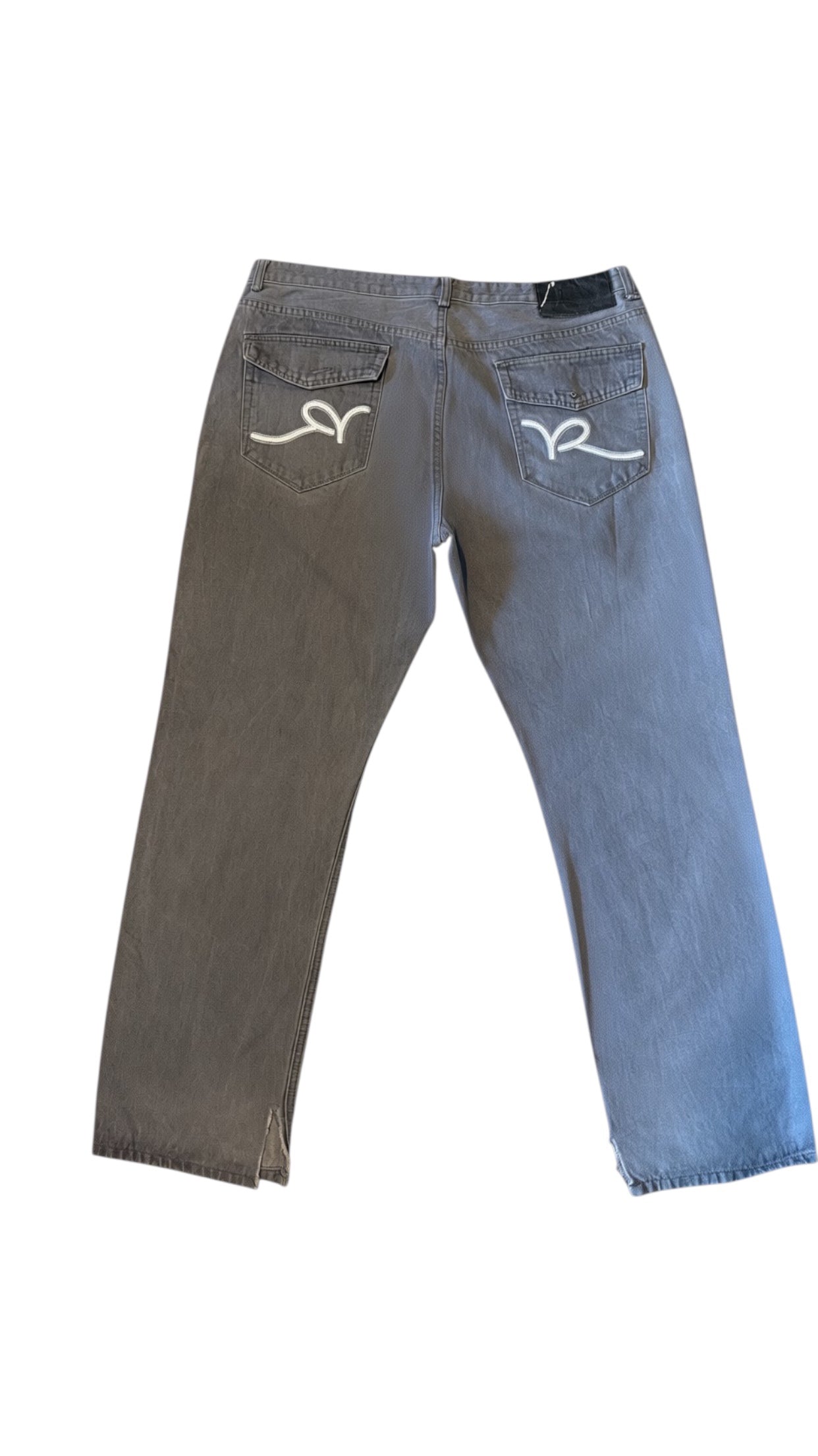 SohoStich Co. grey denim jeans with white stitching detail on back pockets and split hem.