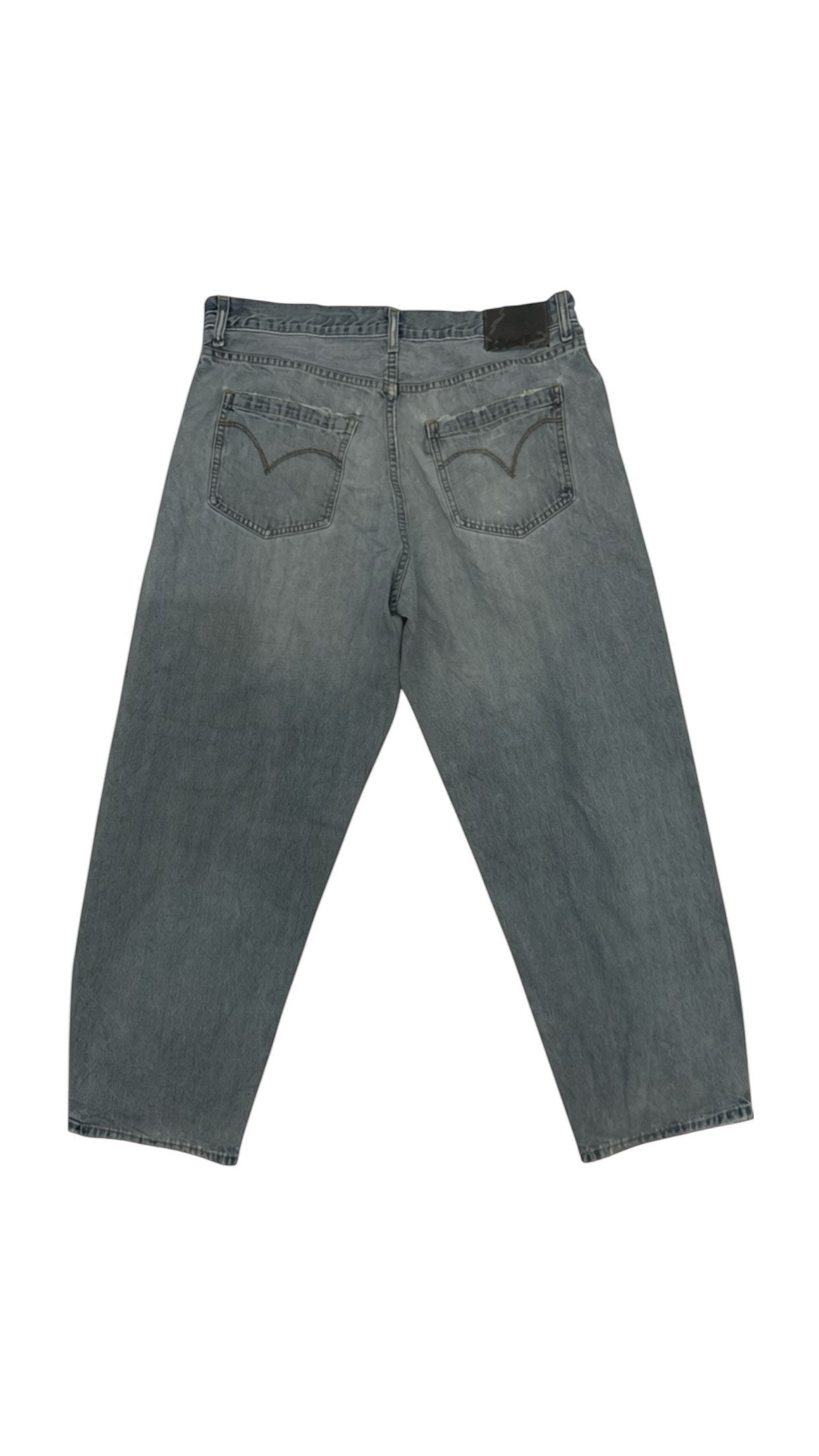 SohoStich Co. grey relaxed fit denim jeans with five-pocket design and leather patch.