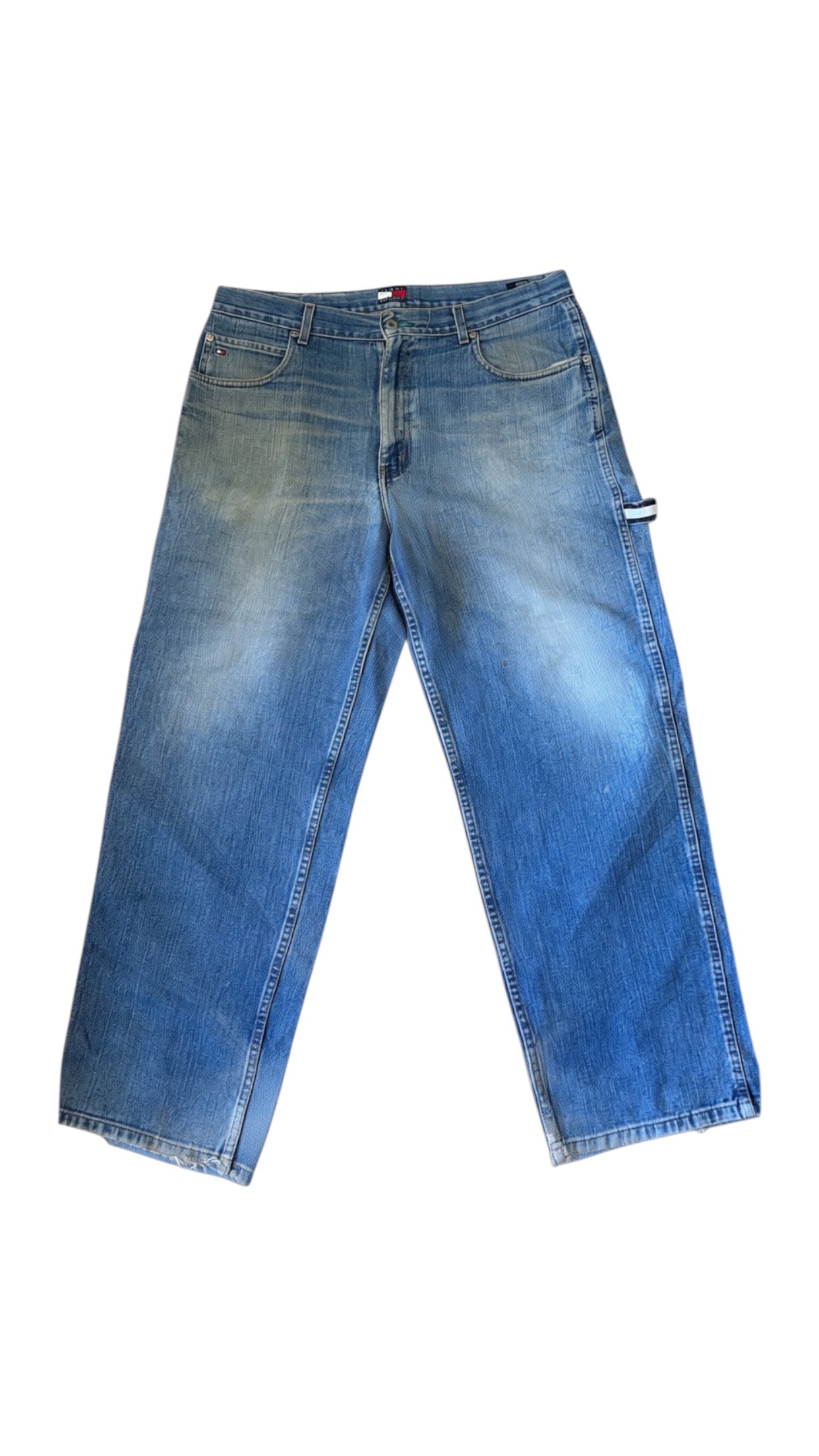 SohoStich Co. light blue relaxed fit denim carpenter jeans with fading and whiskering.