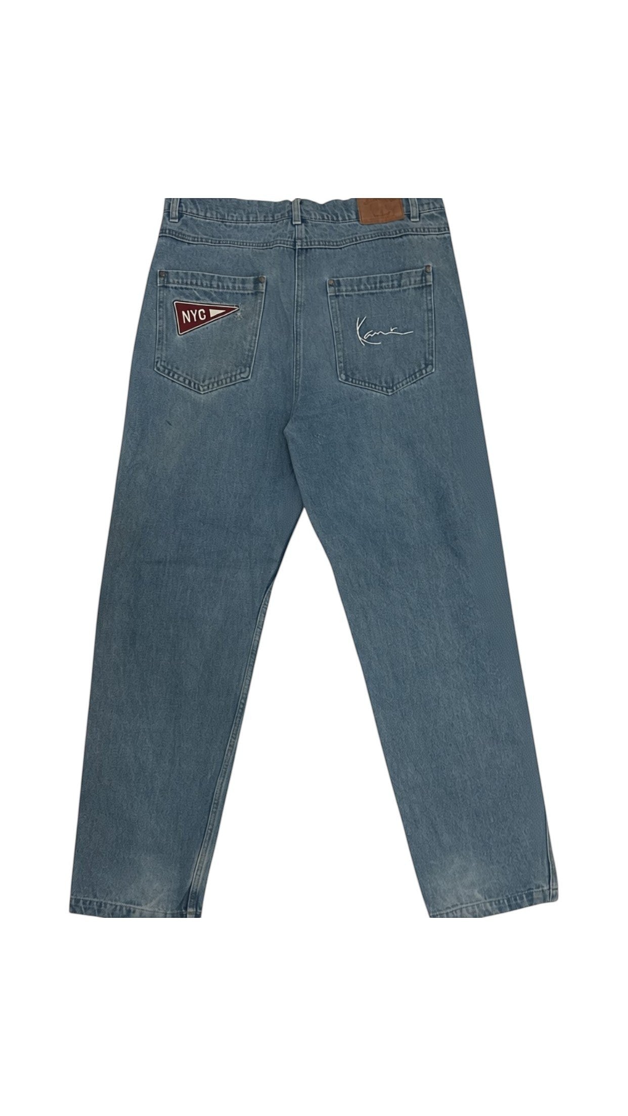 SohoStich Co. light wash denim jeans with relaxed fit and NYC pennant detail on back pocket.