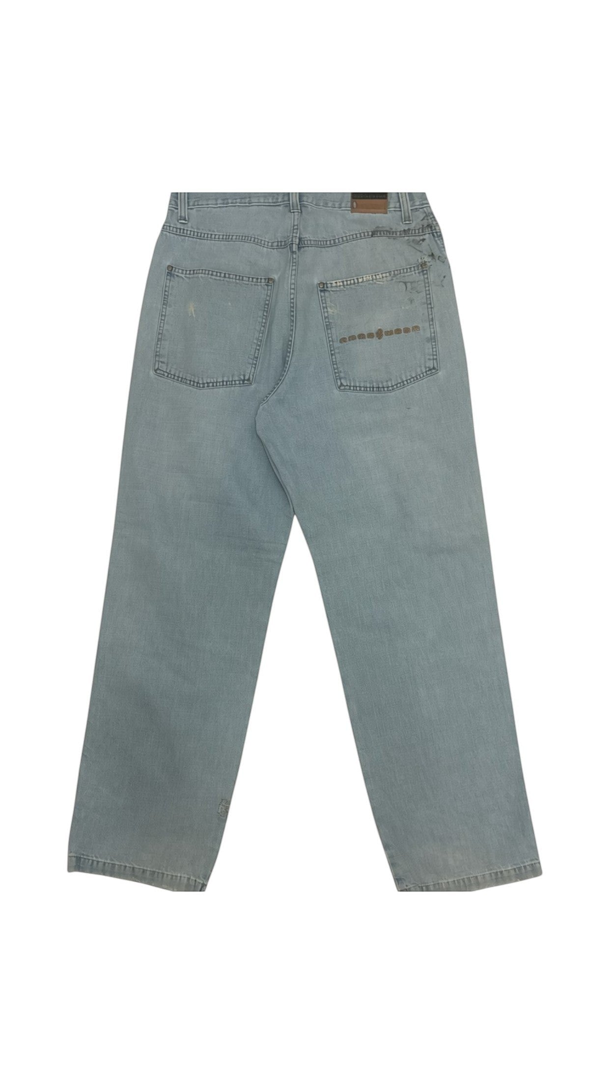 SohoStich Co. light wash relaxed fit denim jeans with distressed details and unique pocket design.