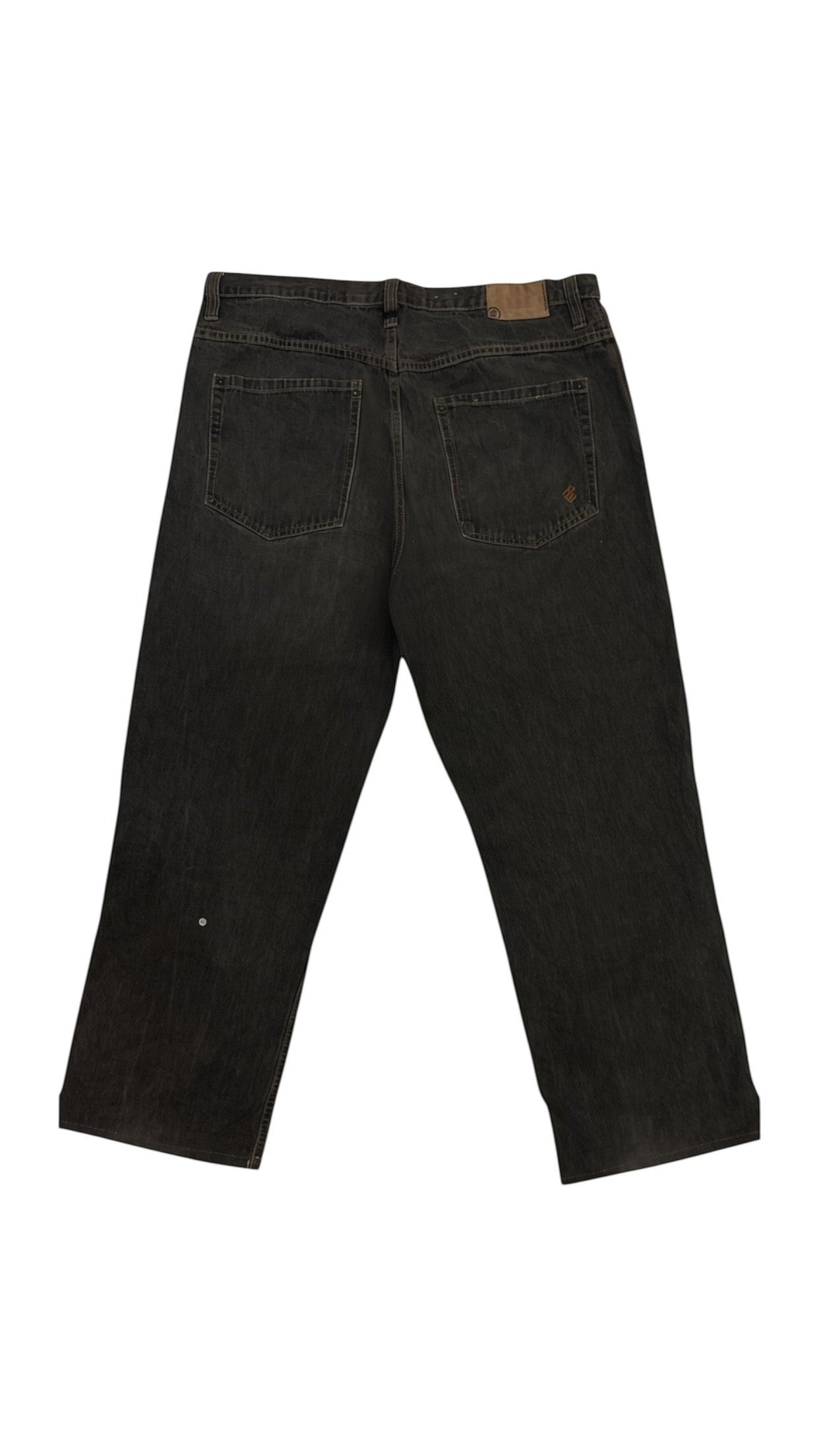 SohoStich Co. Men's relaxed fit black denim jeans with five-pocket design and subtle logo emblem on back pocket.
