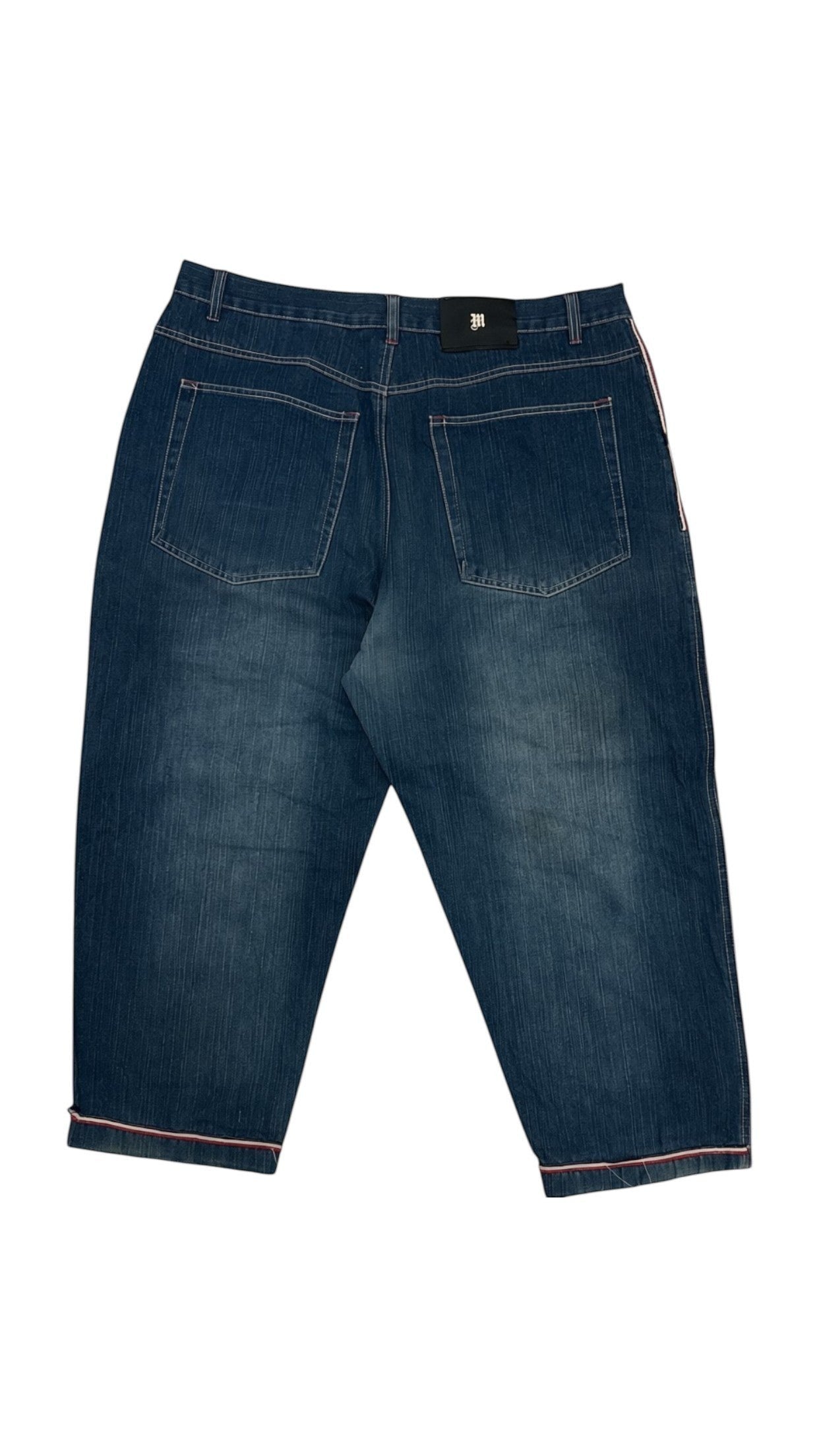 SohoStich Co. medium-wash denim cropped jeans with five-pocket style and pink contrast hem piping.