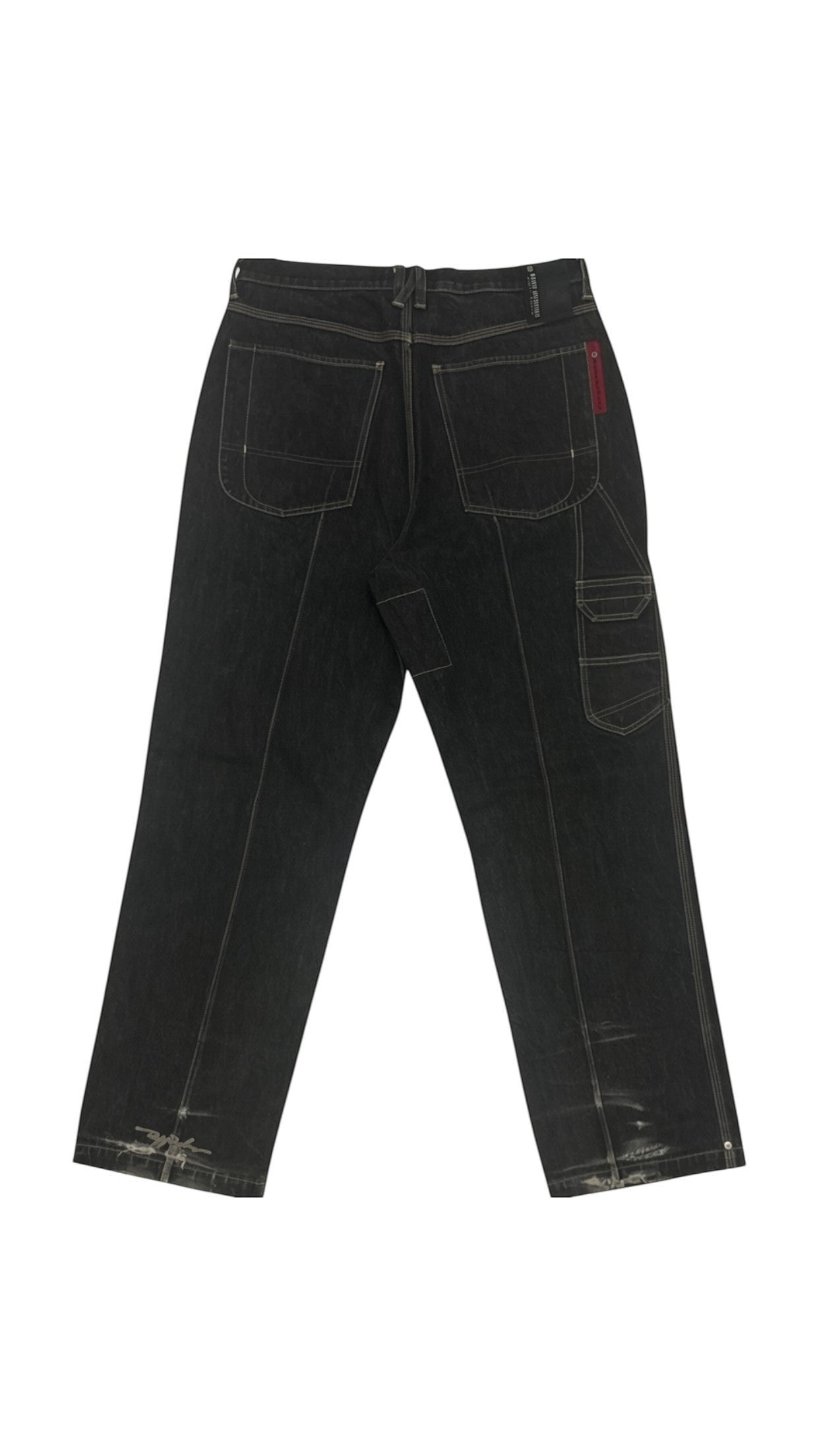 SohoStich Co. Men's dark wash denim carpenter jeans with contrasting stitching, cargo pocket, and distressed hems.
