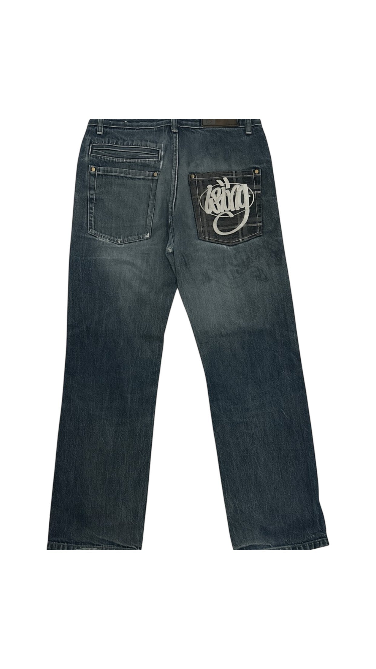 SohoStich Co. Men's relaxed fit dark wash denim jeans with embroidered logo on back pocket.