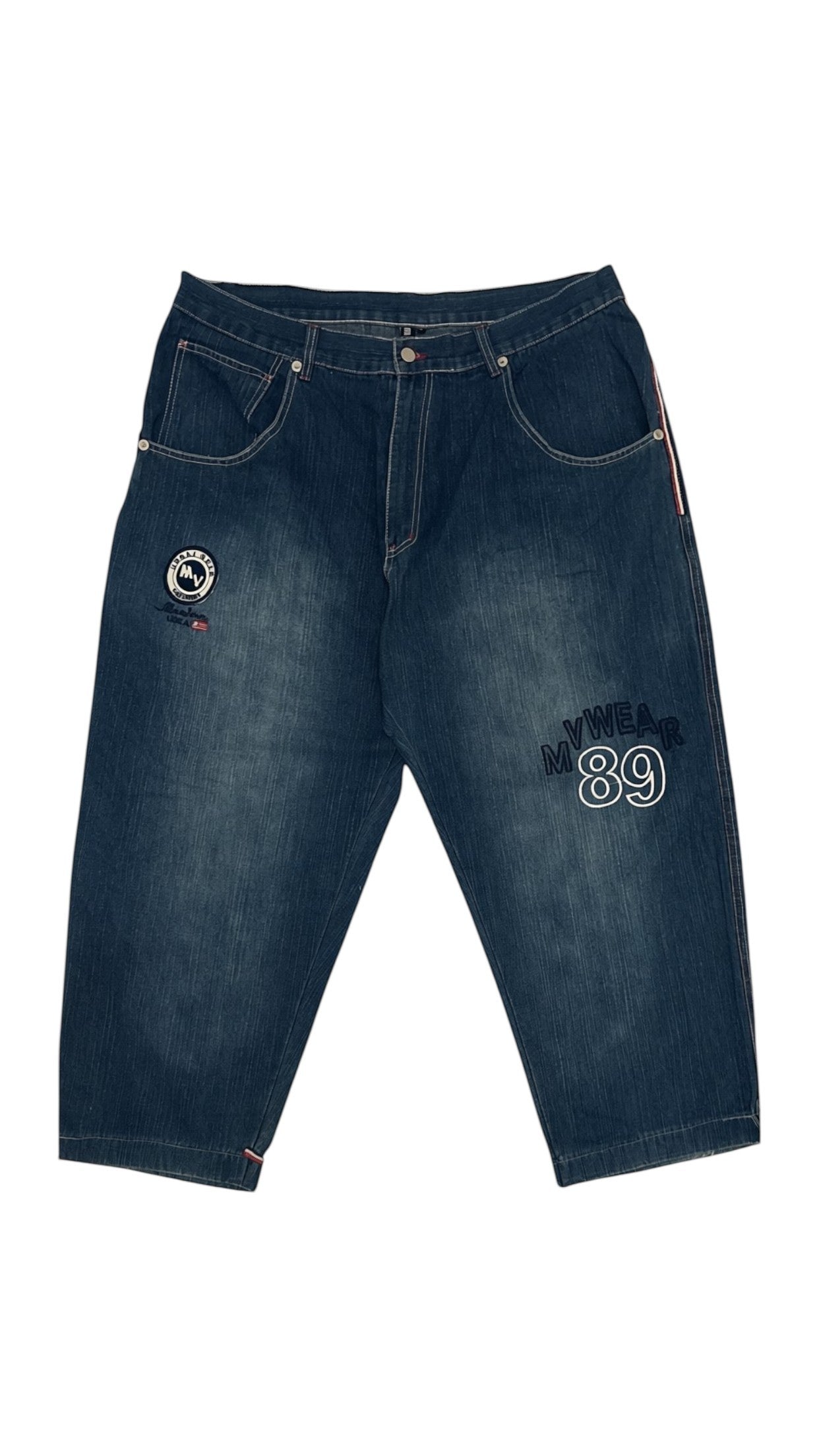 SohoStich Co. men's medium-wash denim cropped jeans with contrast pink hem piping and embroidered logo.