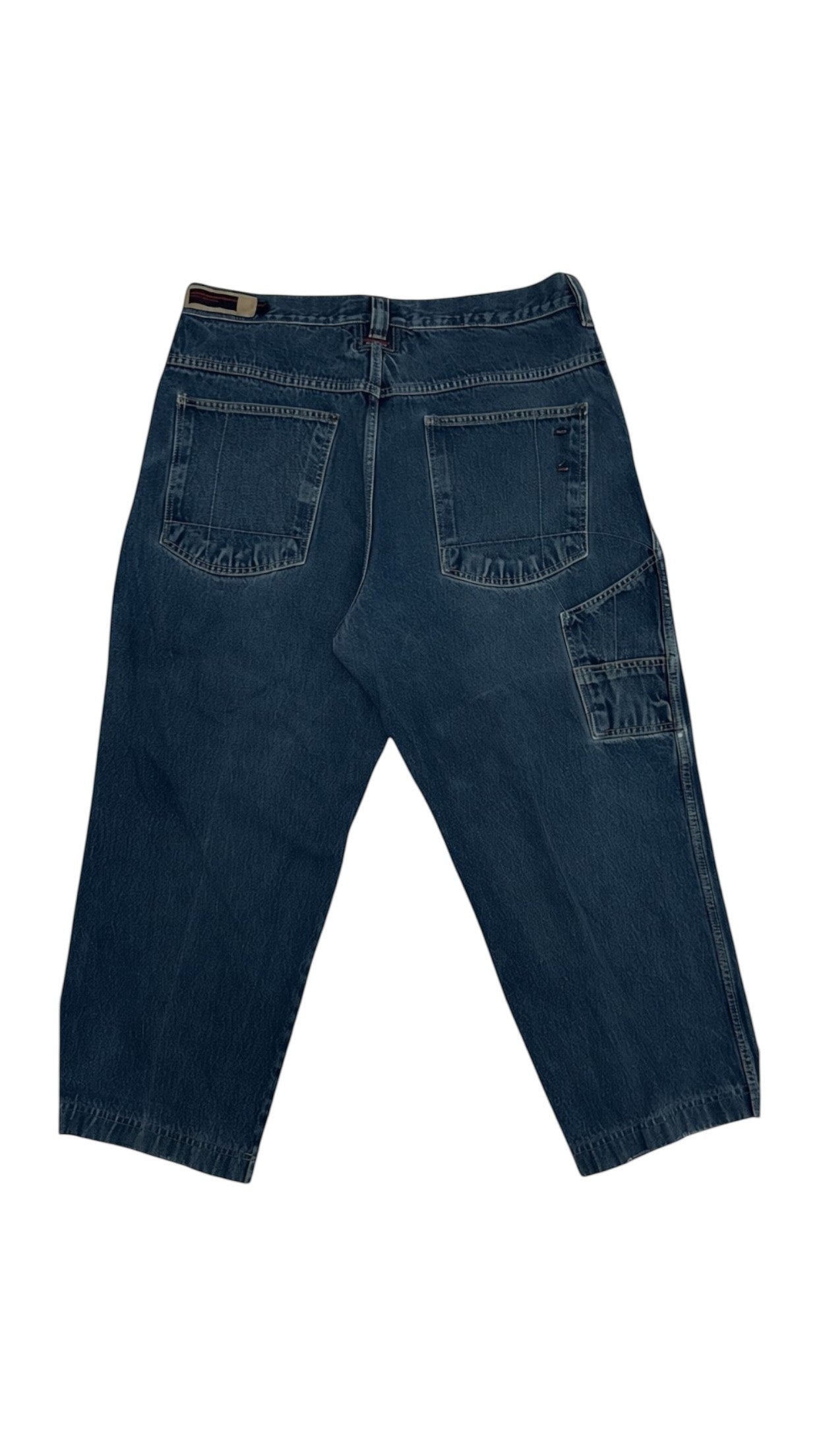 SohoStich Co. Men's dark wash relaxed fit denim carpenter jeans with functional pocket and loop.