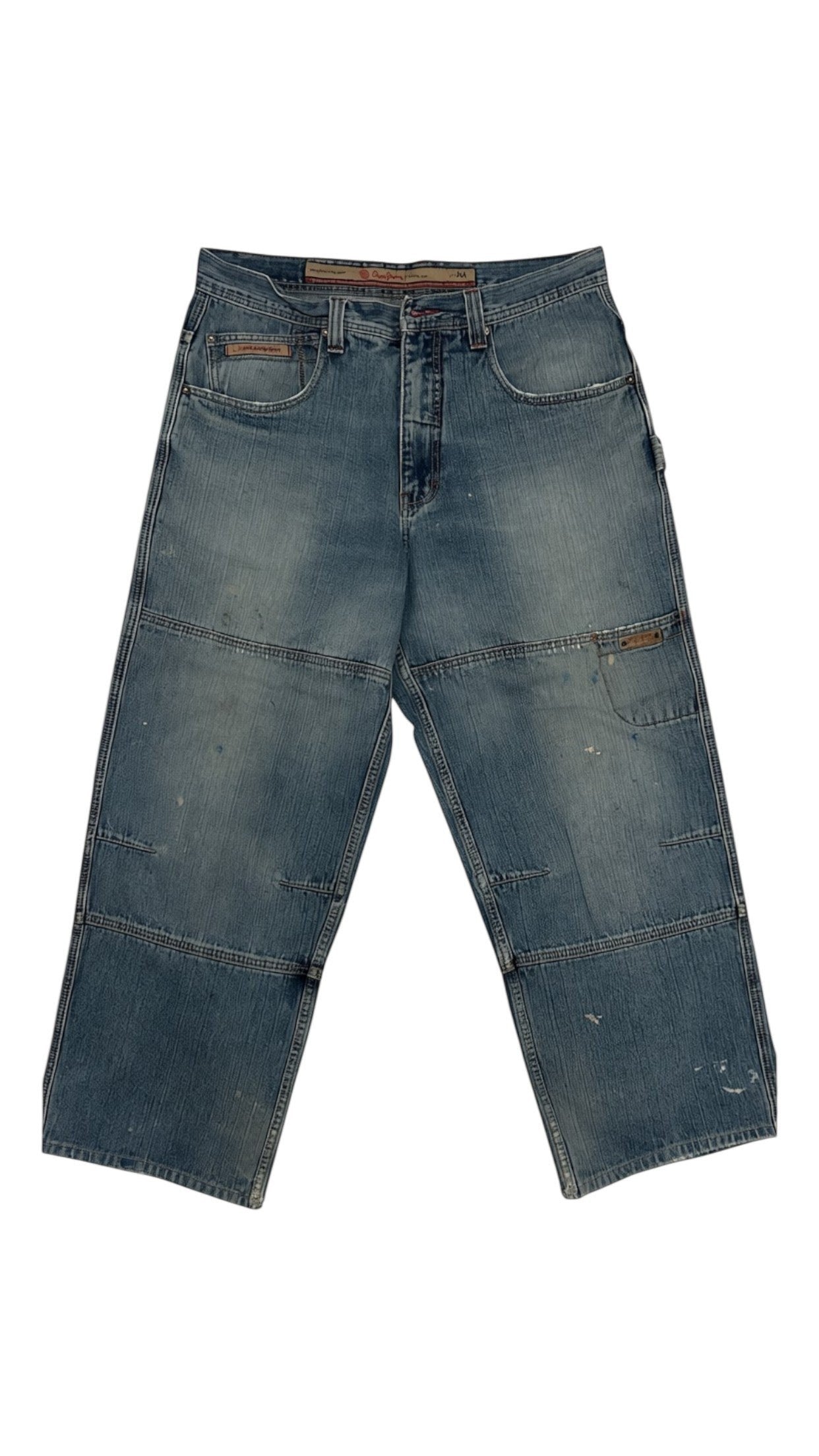 SohoStich Co. Men's relaxed fit light wash denim carpenter jeans with paneling and workwear pocket detail.