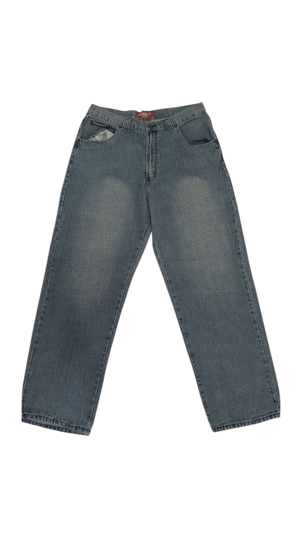 SohoStich Co. relaxed fit medium wash denim jeans with embroidered back pockets and five-pocket design.