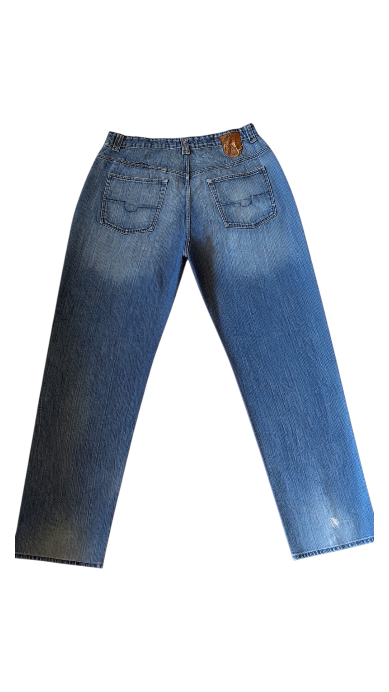 SohoStich Co. men's relaxed fit medium wash denim jeans with five-pocket design and whiskering details.