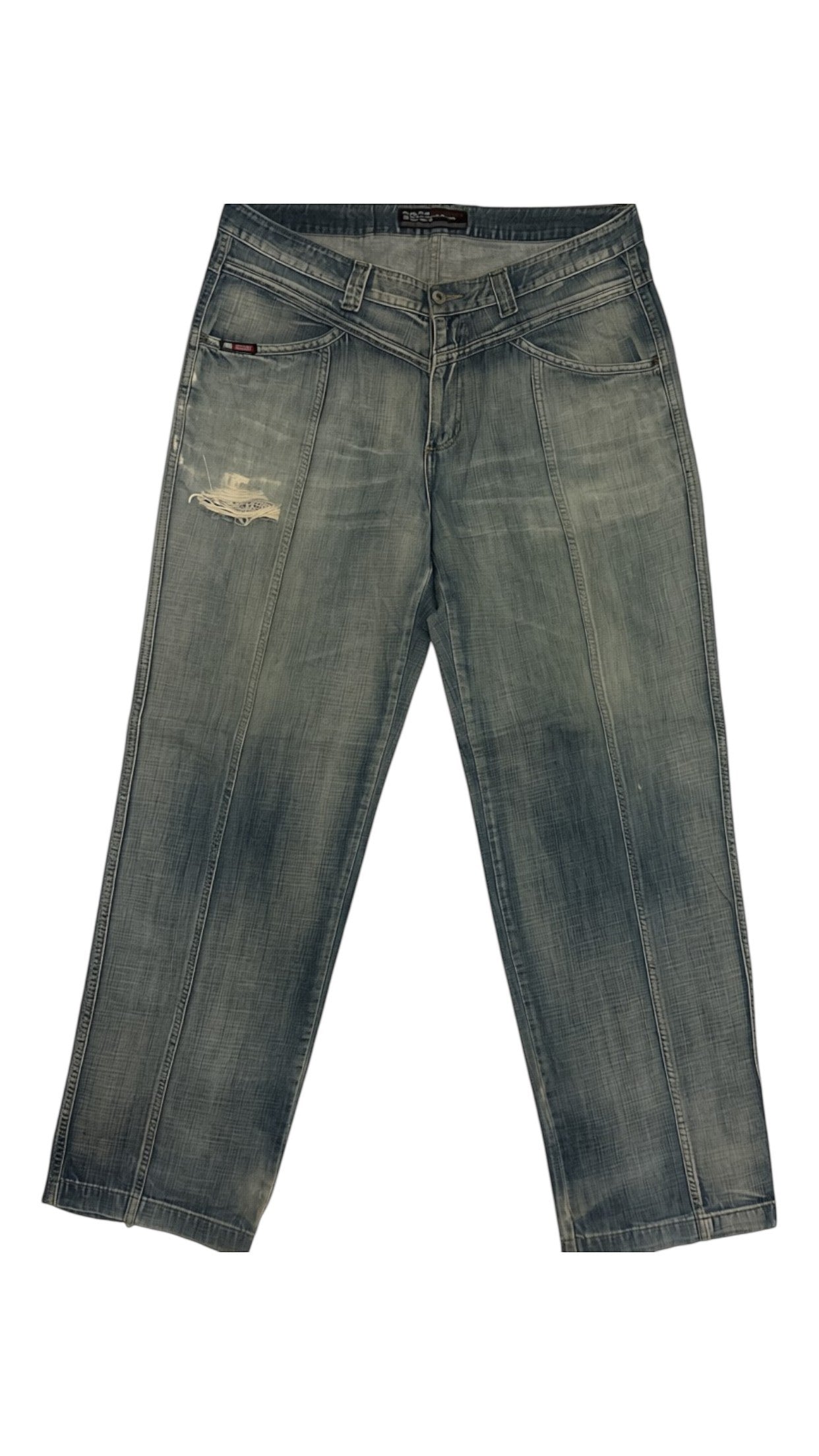 SohoStich Co. light-wash denim jeans with relaxed fit, vertical seams, and distressed thigh patch.