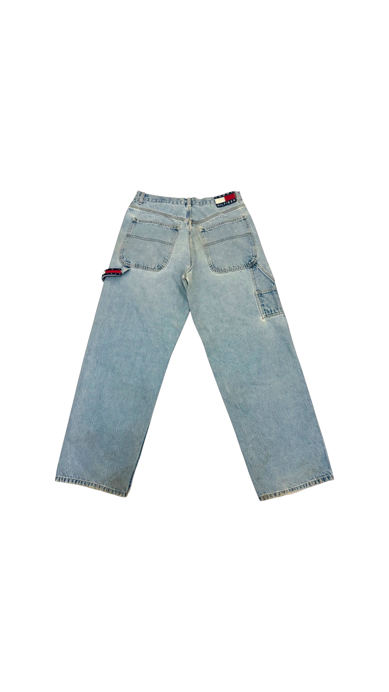 SohoStich Co. vintage light-wash denim carpenter jeans with Tommy Hilfiger logo tag, hammer loop, and utility pocket.