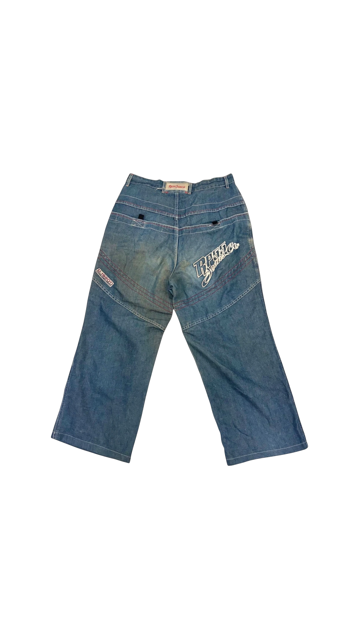 SohoStich Co. light blue washed denim jeans with wide legs and embroidered accents on back pockets.